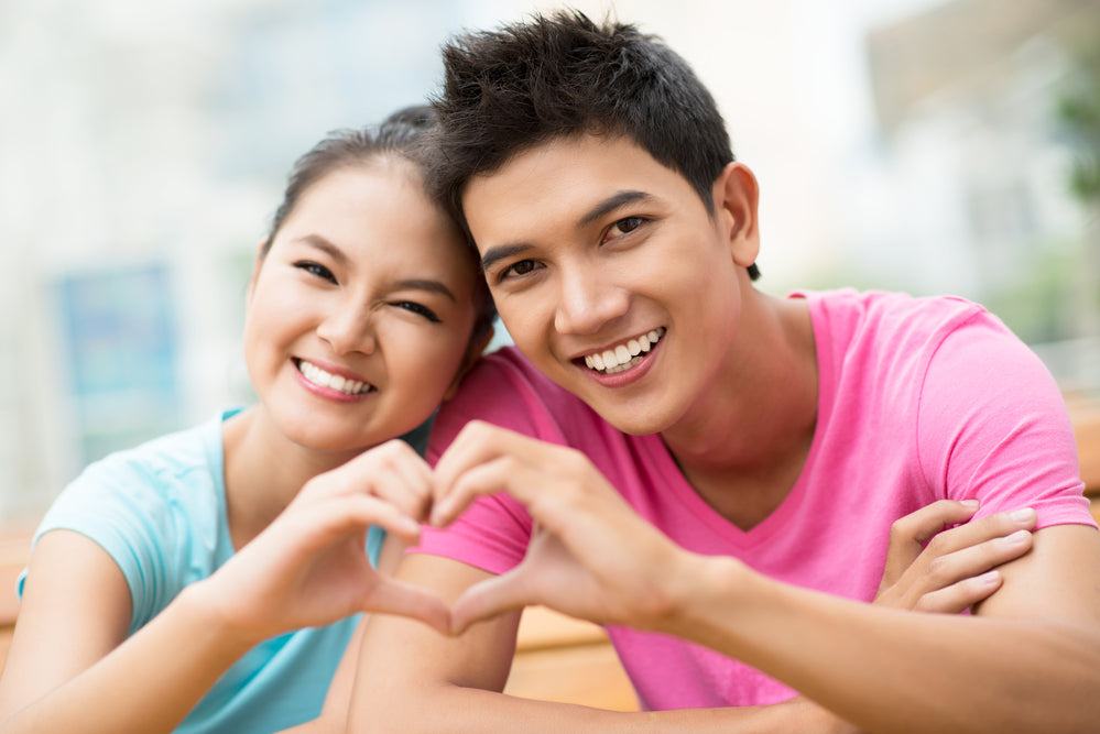 Young Asian couple with beautiful smiles