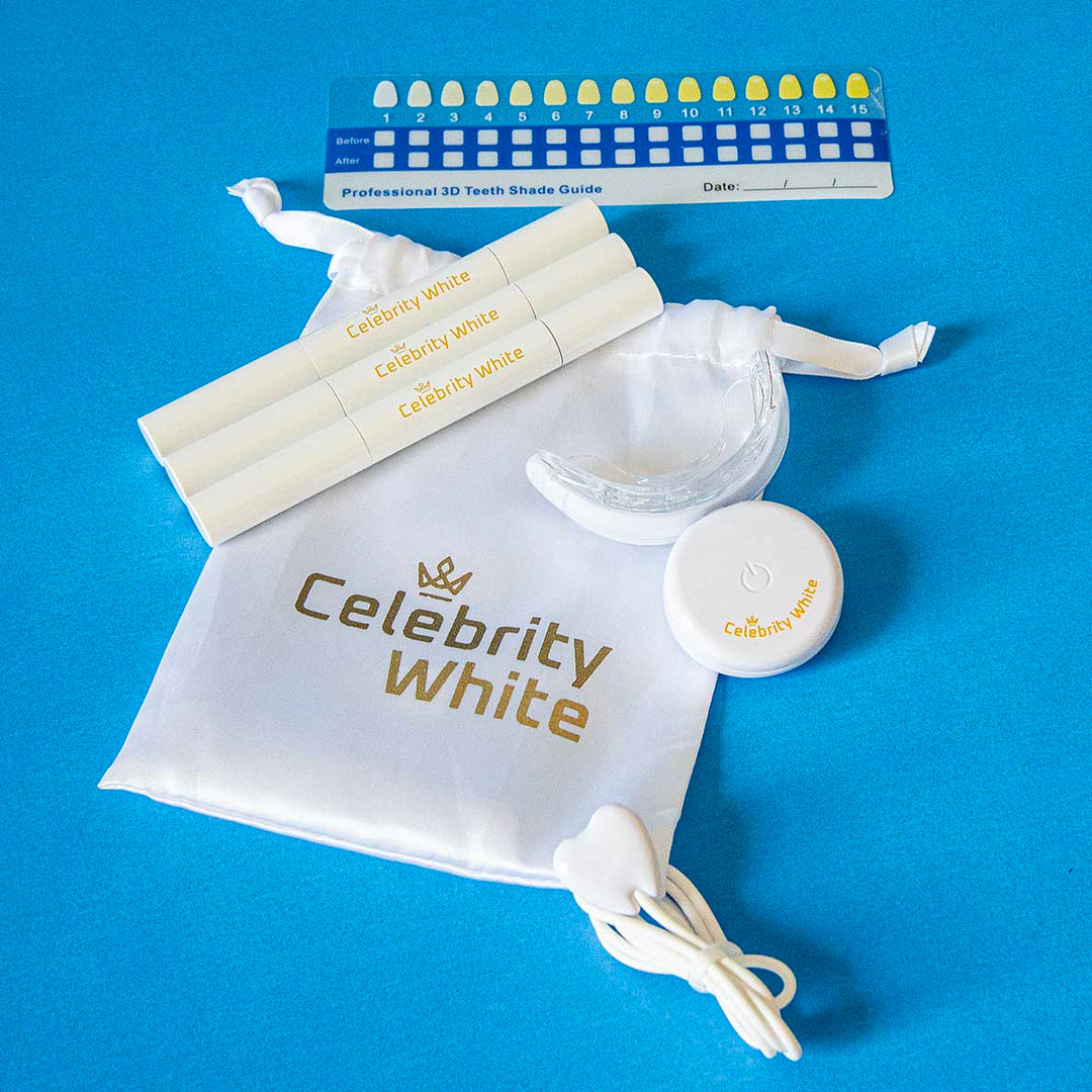 Celebrity White Kit with Shade Guide, LED BLUE-RED Light Mouthpiece, 3 Whitening Pens and User Guide.